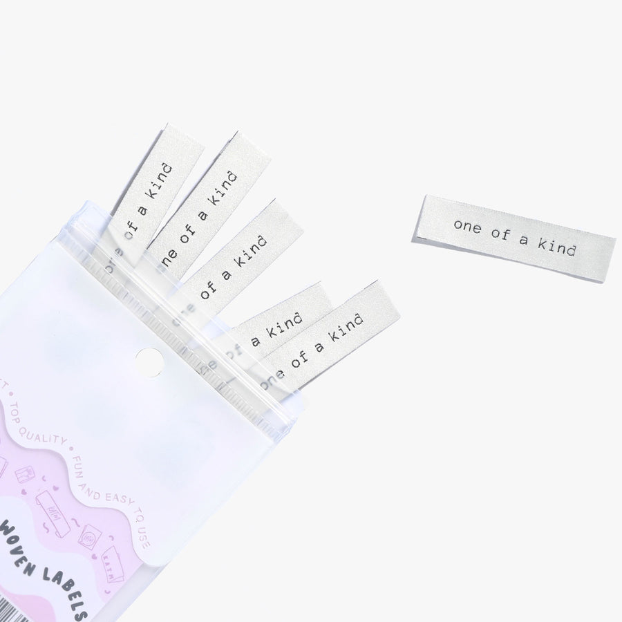 ONE OF A KIND- Kylie and Machine labels